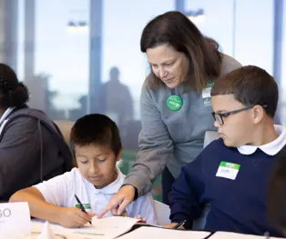 mentor working with student